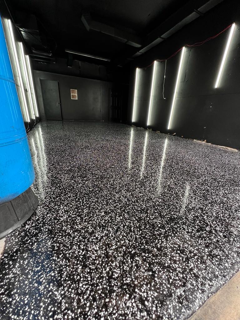 Black and white flake epoxy floor